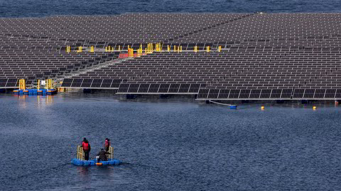 Floating solar panels manufactured by Hanwha Solutions Corp. on the Hapcheon Dam in Hapcheon, Gyeongsangnam-do province, South Korea, on Tuesday, Feb. 8, 2022. More than 92,000 solar panels floating on the surface of a reservoir are able to generate 41 megawatts, enough to power 20,000 homes. Photographer: SeongJoon Cho/Bloomberg